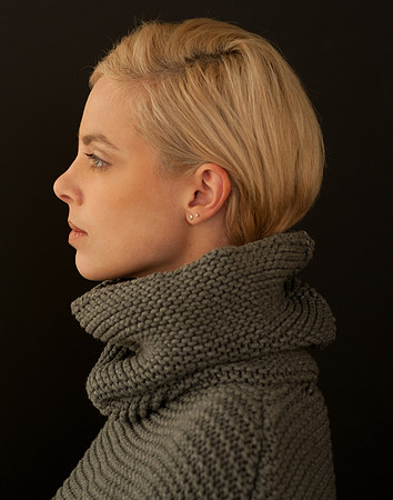 Profile Headshot Of Woman in Turtleneck