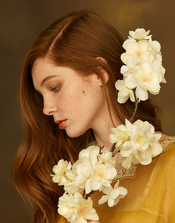 Redhead Profile with Flowers